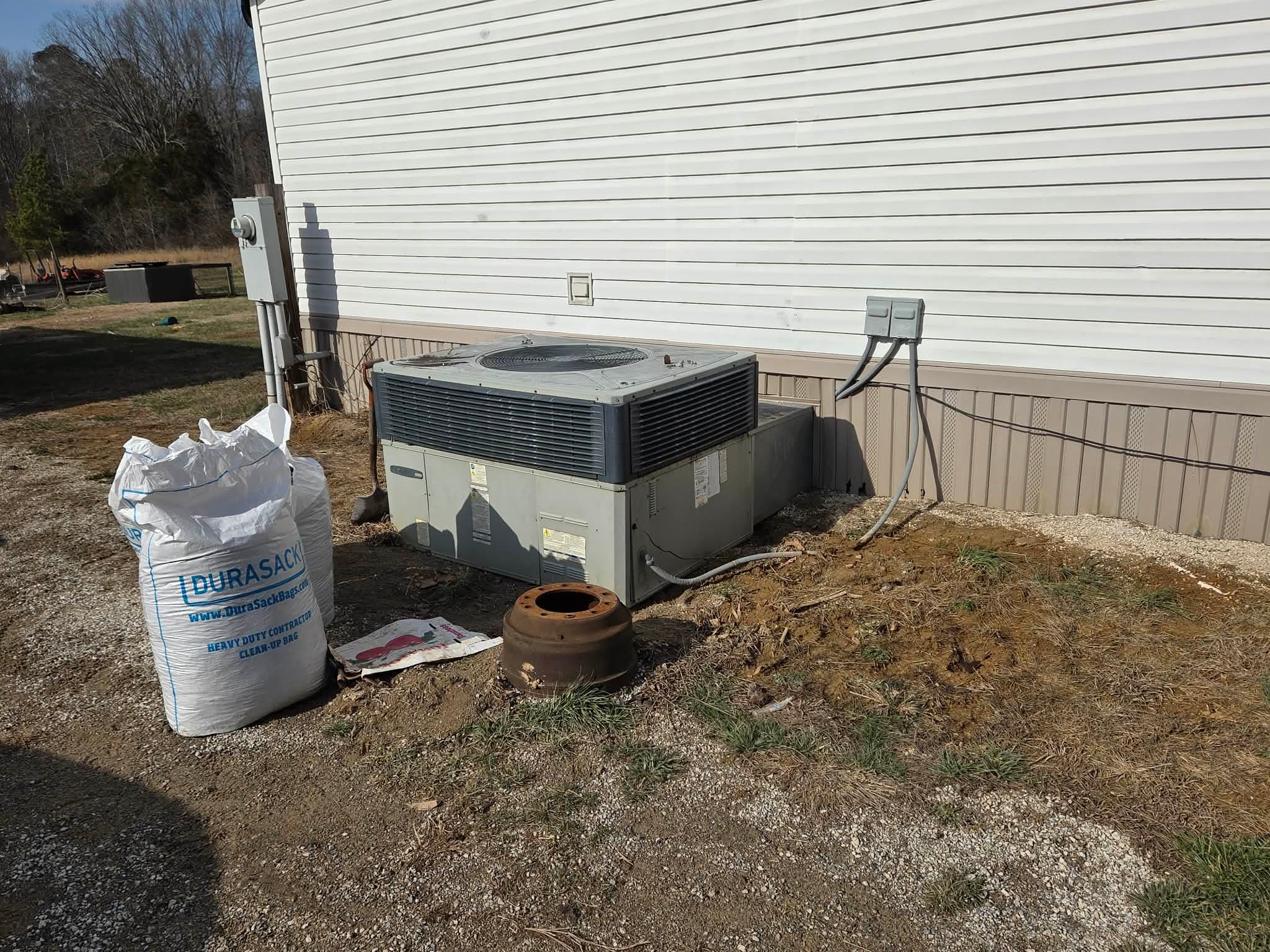 Before: older package unit at the same home, photographed from a different angle